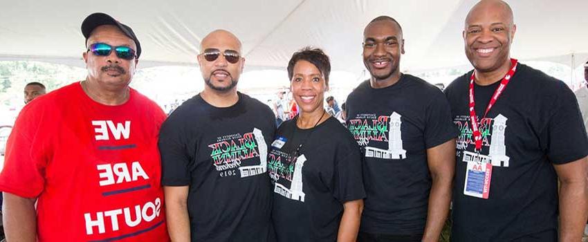 Members of the Black Alumni Society tailgating.